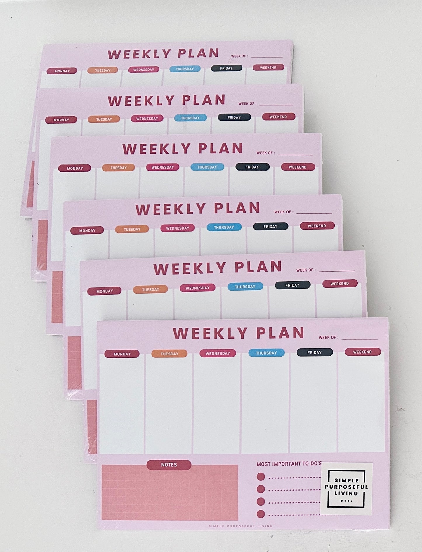 mage of Simple Purposeful Living Weekly Planner Notepad Bundle - Six Notepads for Weekly Planning, Buy 5 Get 1 Free, Free Shipping, Ideal Gift for Teachers, Graduates, Moms. Modern Design, Ample Space, Undated Calendar System, High-Quality Paper.