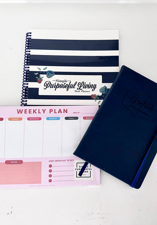 Image of Limited Edition Mother's Day Bundle from Simple Purposeful Living. Includes Best-Selling 52 Week Meal Planner, Gratitude Journal, Weekly Plan Notepad, FREE Priority Shipping within the USA, Poly bagged wrap with gift tag. Perfect Mother's Day gift for organization and planning. Give Mom the gift of simplicity and purpose this Mother's Day! Order now!