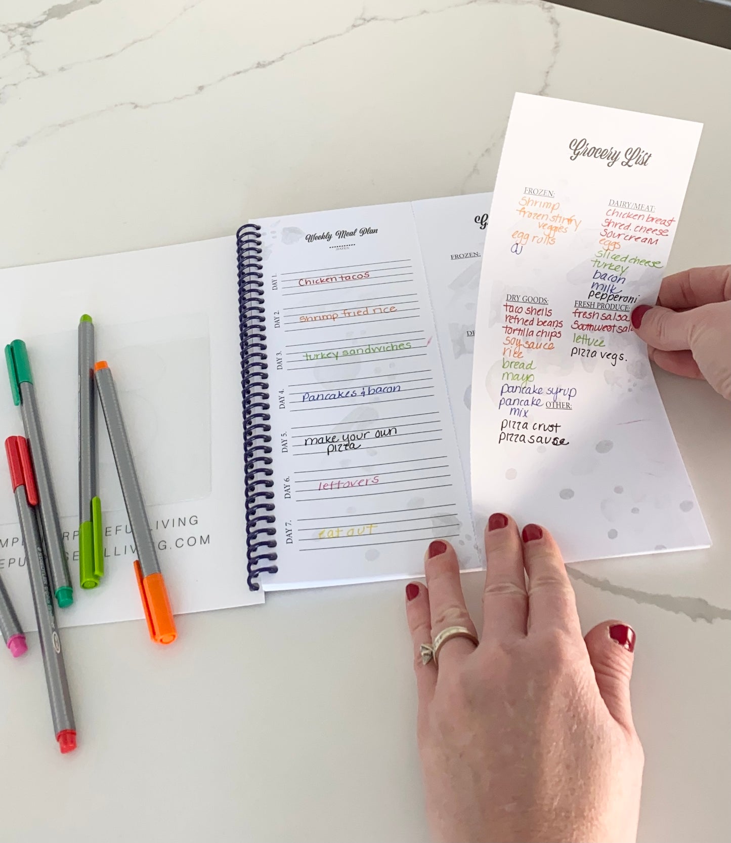Best Selling Simple Purposeful Living 52 week meal planner meal planning spiral bound notebook with tear off grocery list.  This spiral bound food journal simplifies meal planning.